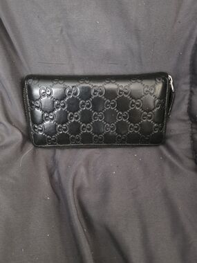 Authentic Gucci Black GG Embossed Zip Wallet